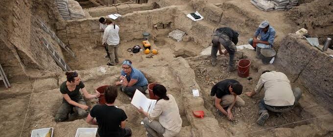 People conducting an archaeological excavation