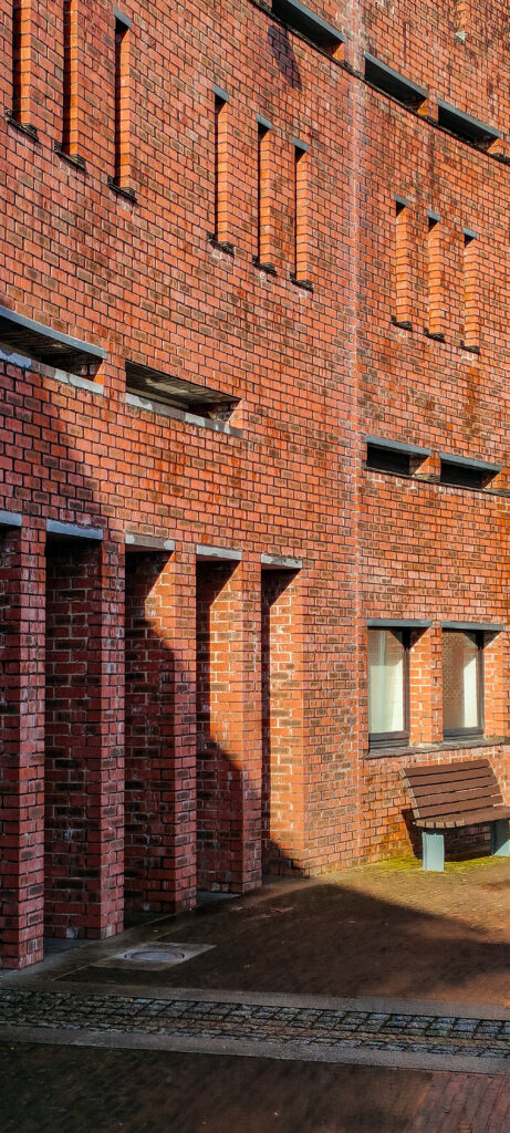 Red brick building with rectangular openings