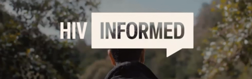 HIV Informed. Picture of the back of a man's head and shoulders as he walks through green trees.