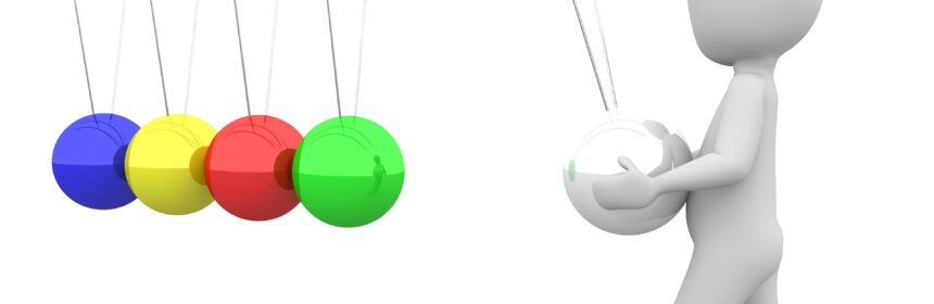 Computer graphics illustration of a person holding and pulling one ball in a colourful newton's cradle