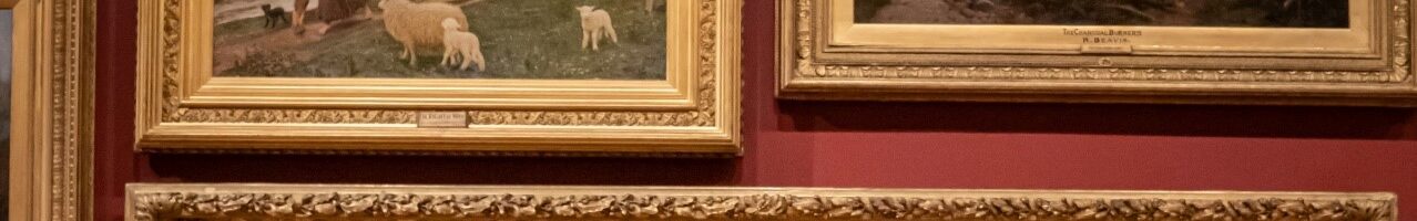 photo of an art gallery with several paintings of animals and nature that are ornate gold framed