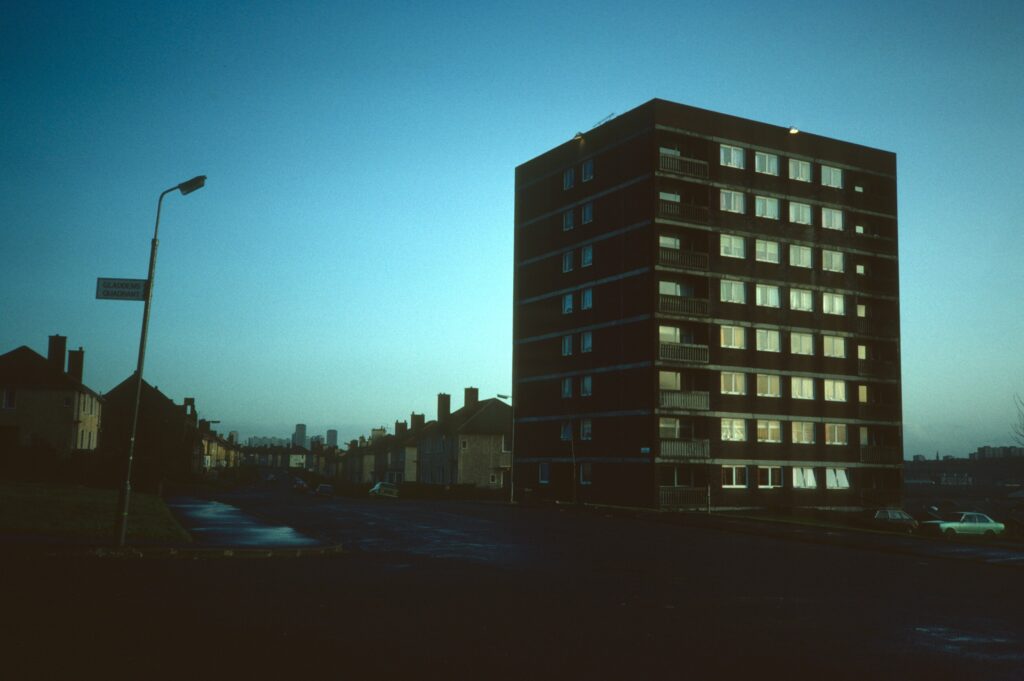 Photograph of tower block on Broadholm Street in Glasgow at dusk. 