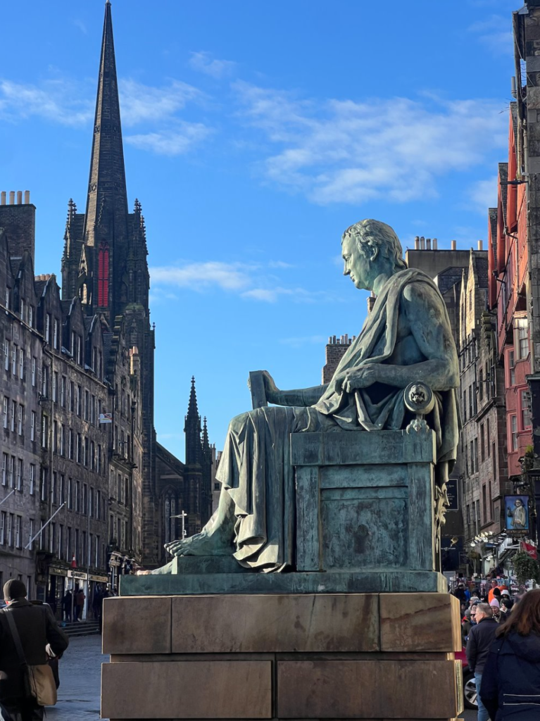 Photograph of the bronze statue of David Hume on Edinburgh's Royal Mile. 